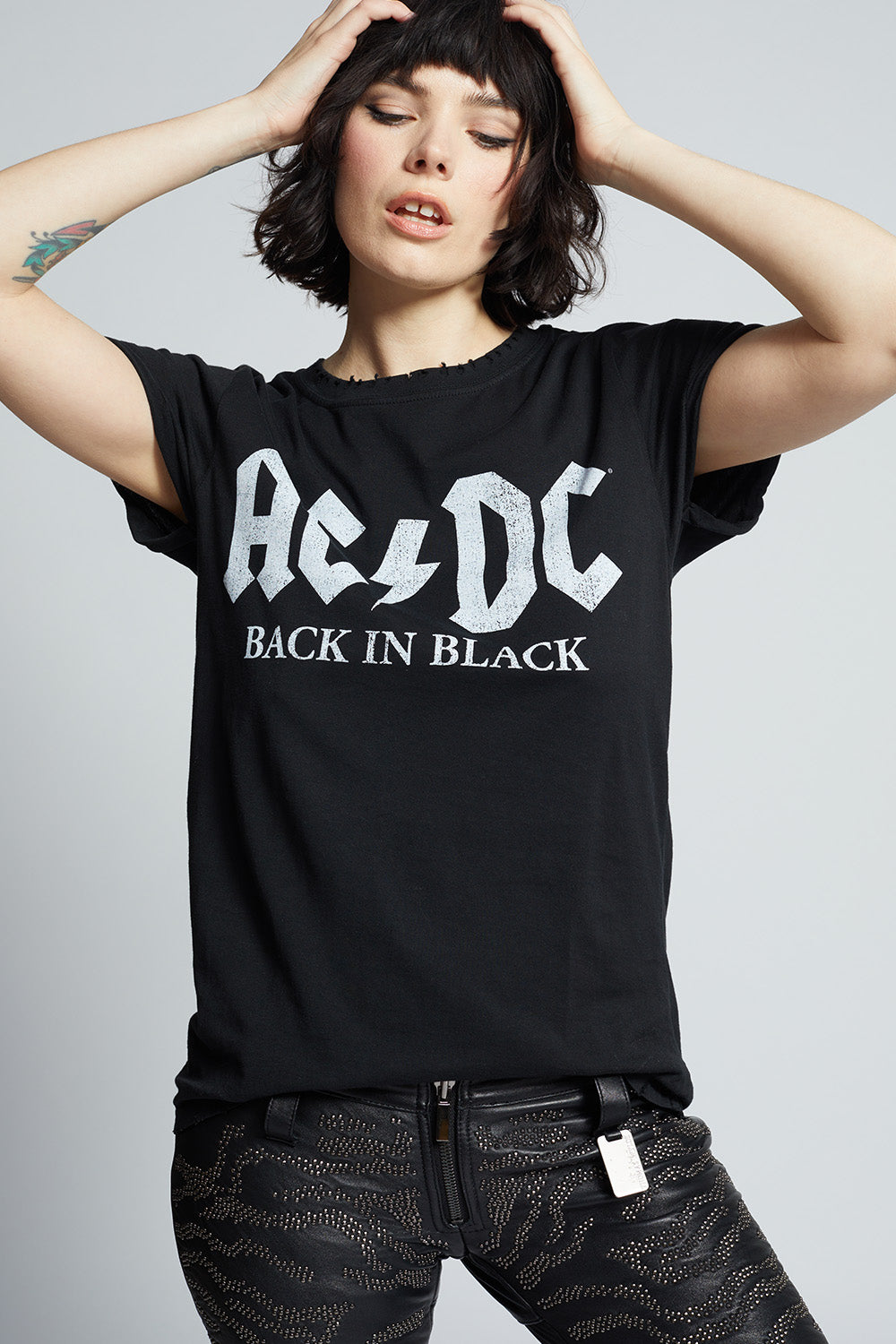 Women's AC/DC Back In Black T-shirt with album and tour graphics