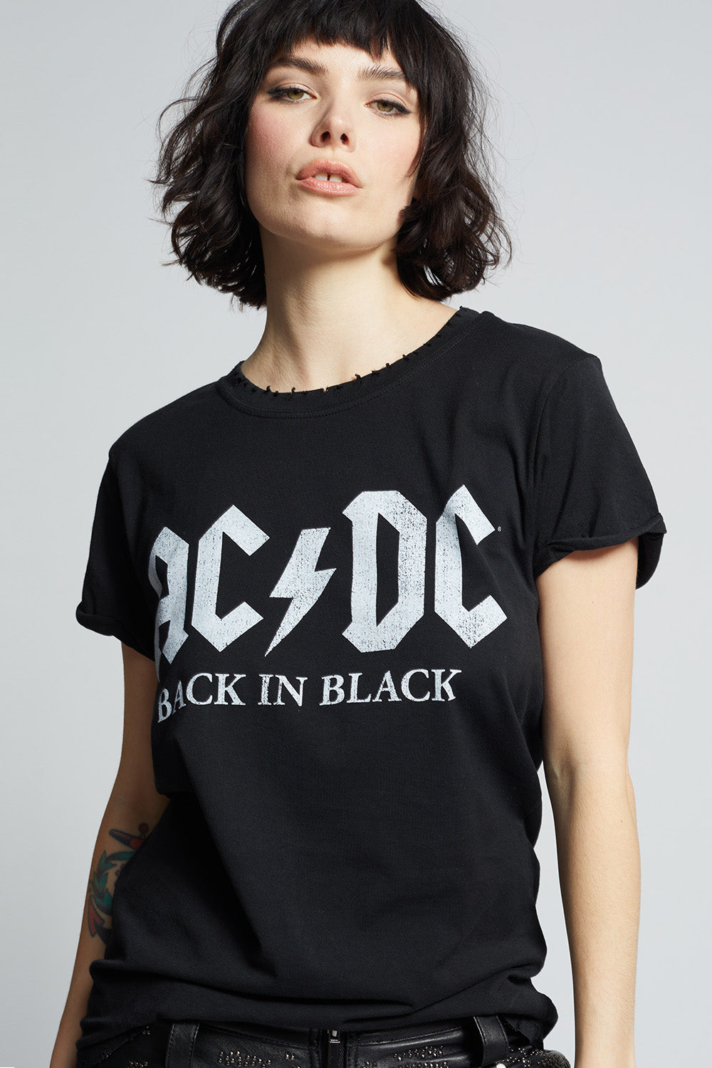 Women's AC/DC Back In Black T-shirt with album and tour graphics