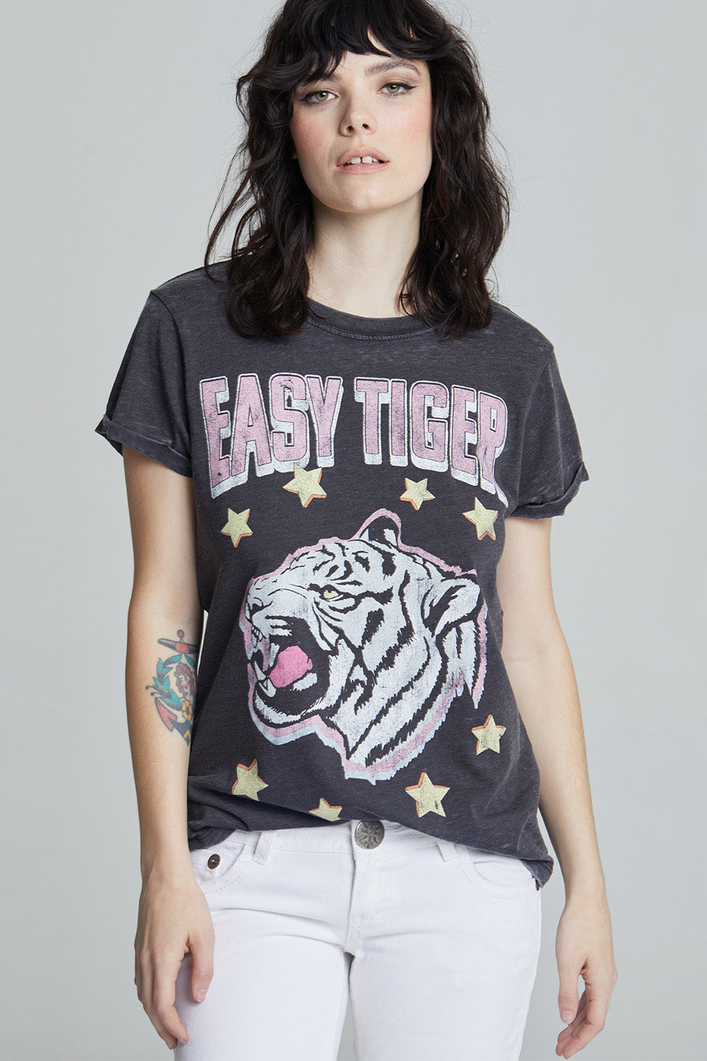 Women's black fitted 'Easy Tiger Star' graphic t-shirt with a black and white tiger, yellow stars, and 'Easy Tiger' text.
