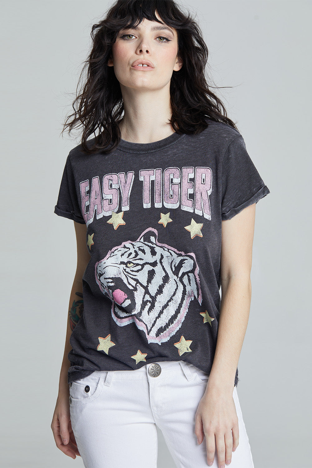 Women's black fitted 'Easy Tiger Star' graphic t-shirt with a black and white tiger, yellow stars, and 'Easy Tiger' text.
