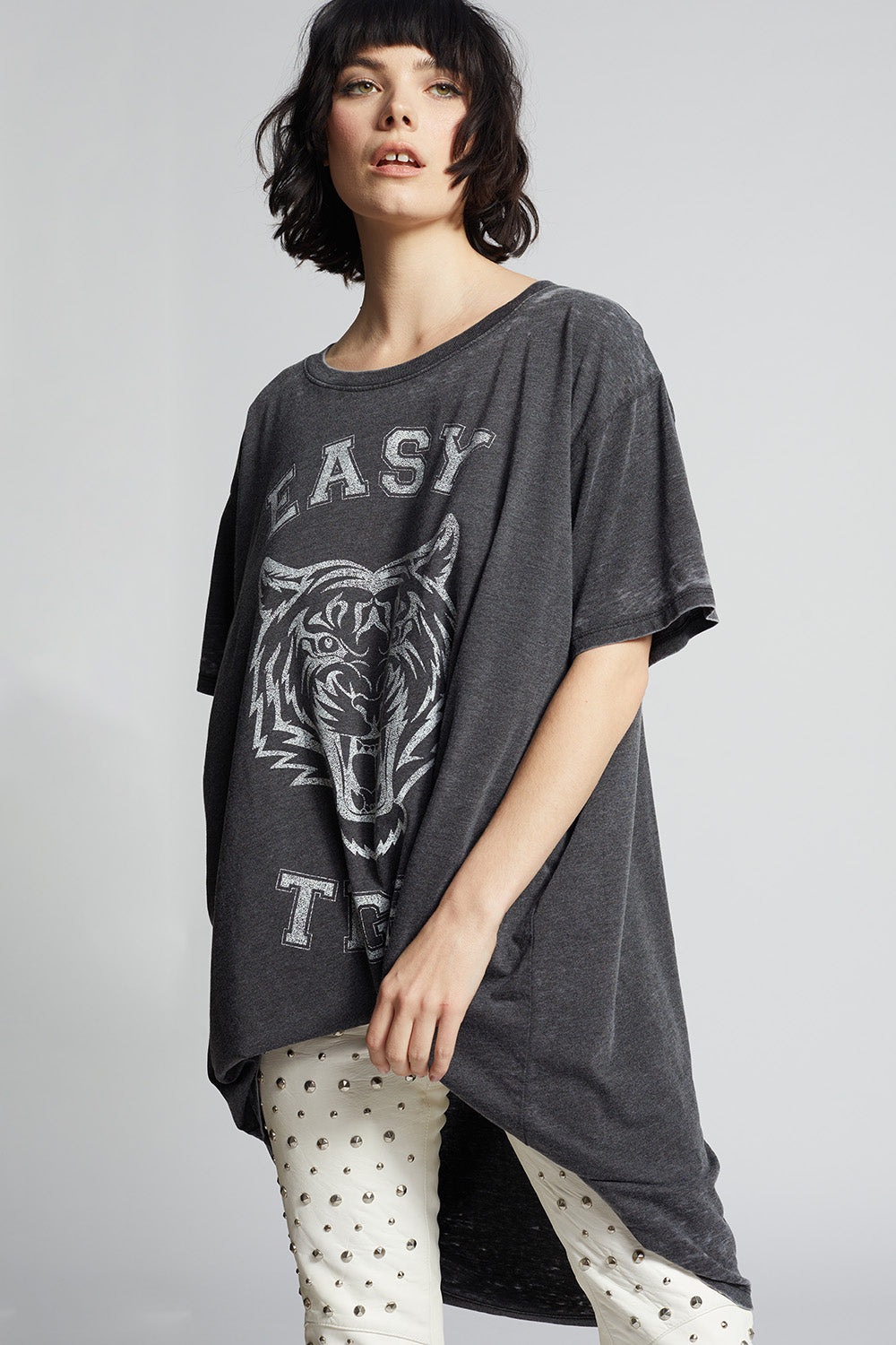 Black oversized 'Easy Tiger' t-shirt dress with a tiger graphic and 'Easy Tiger' text on vintage washed fabric.