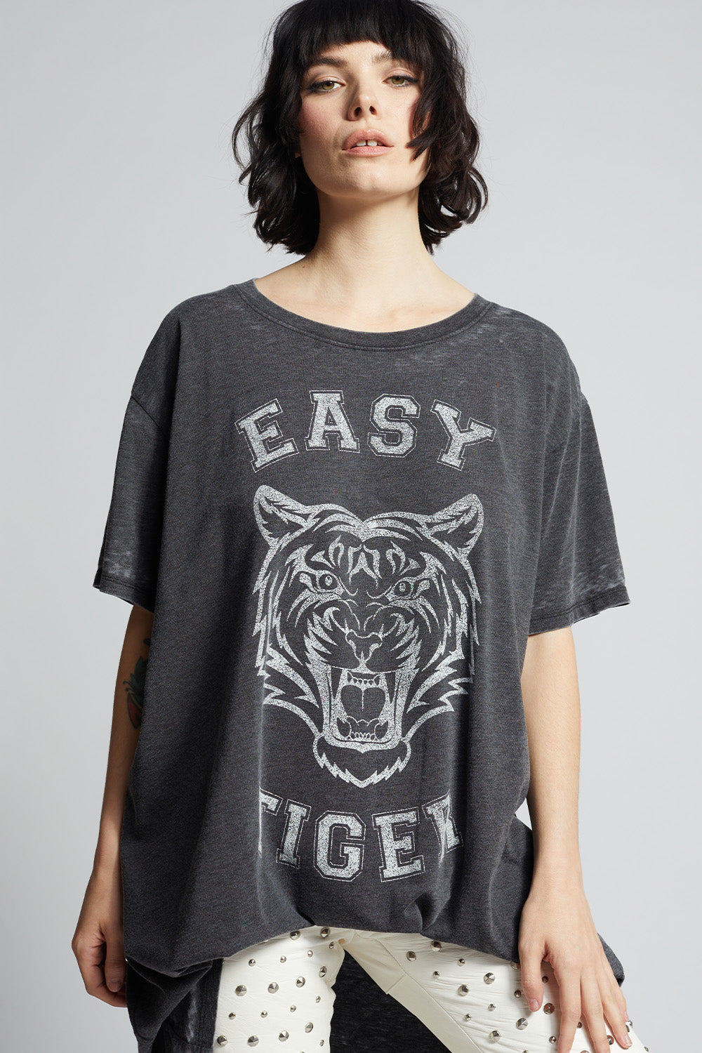 Black oversized 'Easy Tiger' t-shirt dress with a tiger graphic and 'Easy Tiger' text on vintage washed fabric.