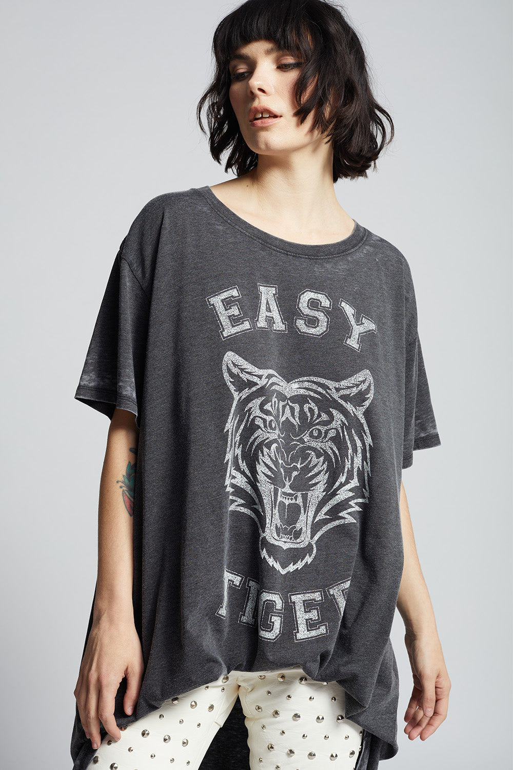 Black oversized 'Easy Tiger' t-shirt dress with a tiger graphic and 'Easy Tiger' text on vintage washed fabric.