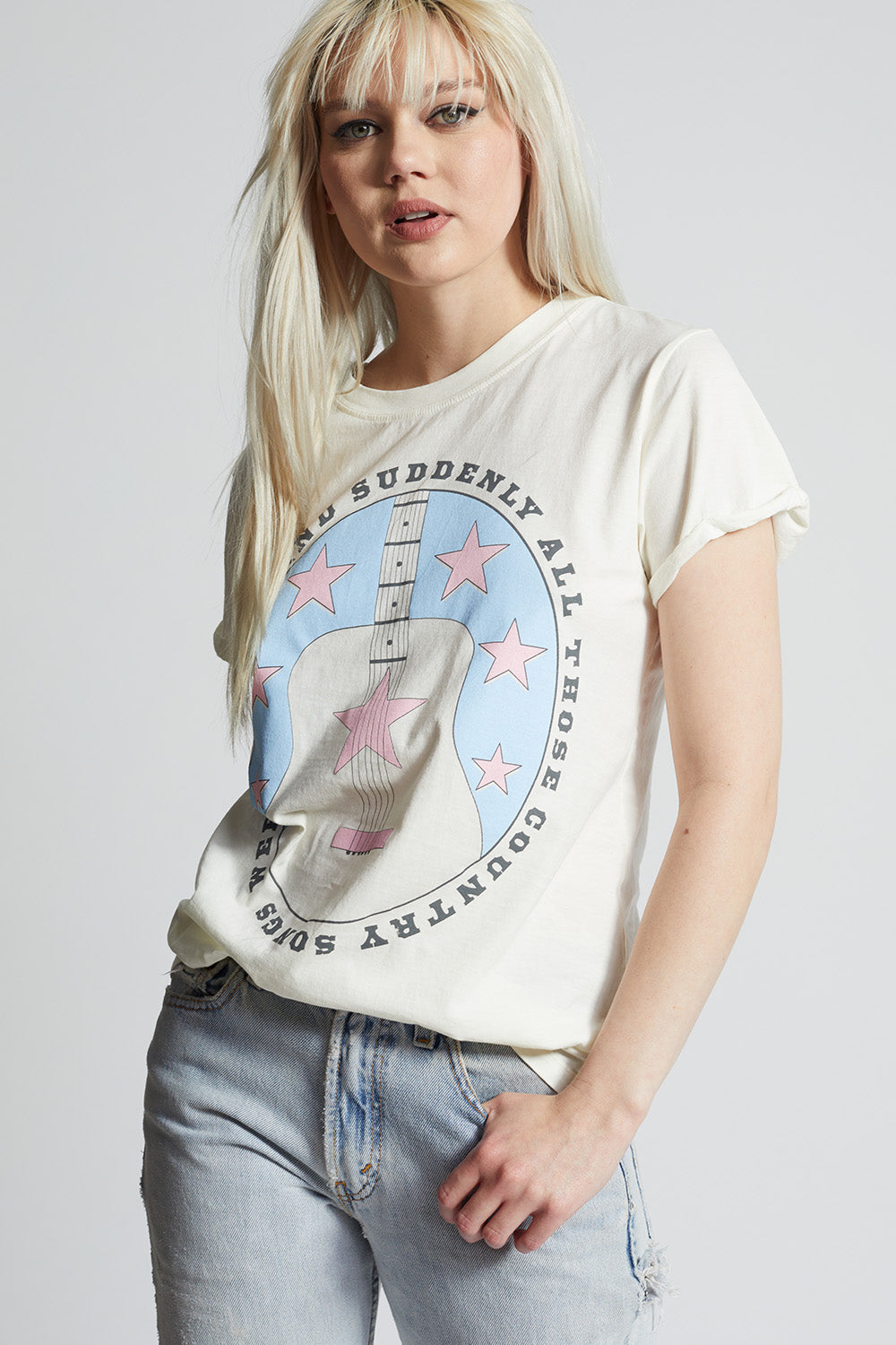 Women's Country Songs About You T-shirt in Pearl with guitar, stars, and "Nashville, Tennessee" graphics