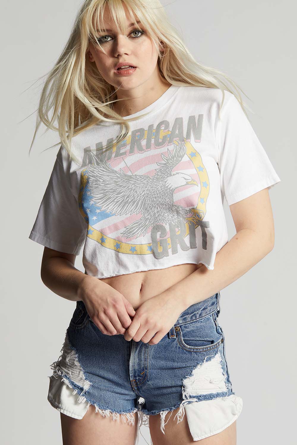 Women's American Grit Cropped Tee in White with American flag and eagle graphic