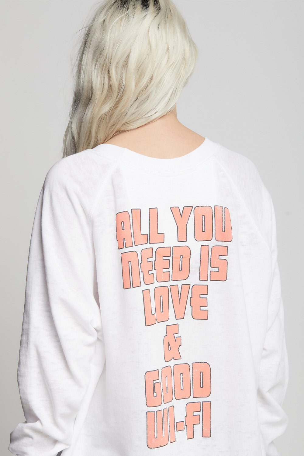 Oversized I Feel Love Sweatshirt in White with cheetah, sun, rose, and text graphics