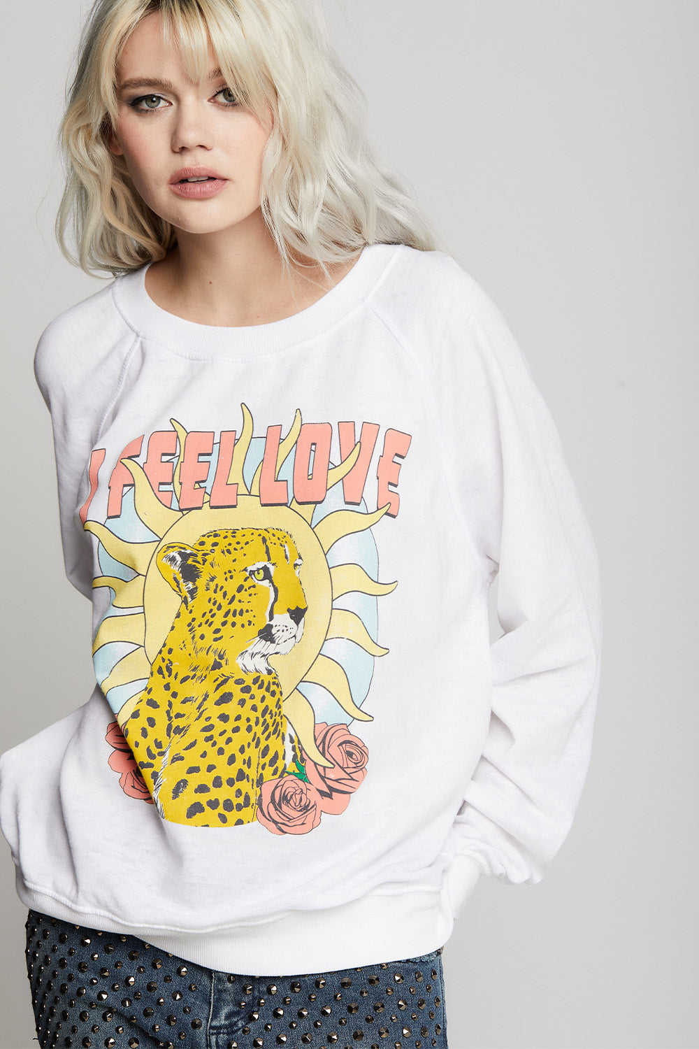 Oversized I Feel Love Sweatshirt in White with cheetah, sun, rose, and text graphics