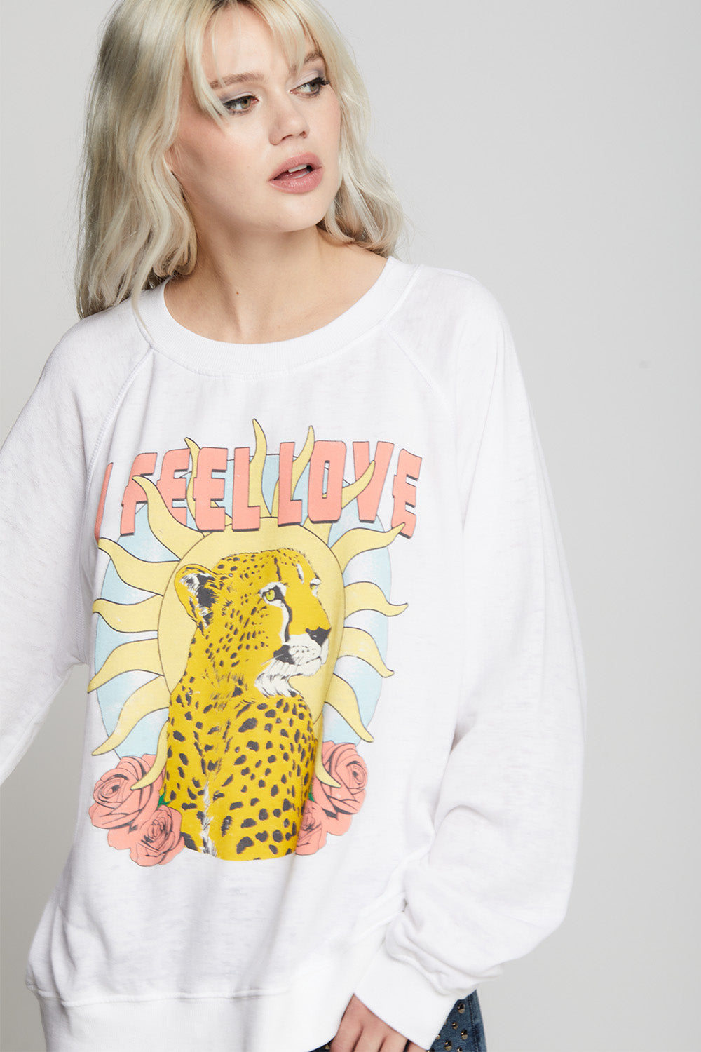 Oversized I Feel Love Sweatshirt in White with cheetah, sun, rose, and text graphics