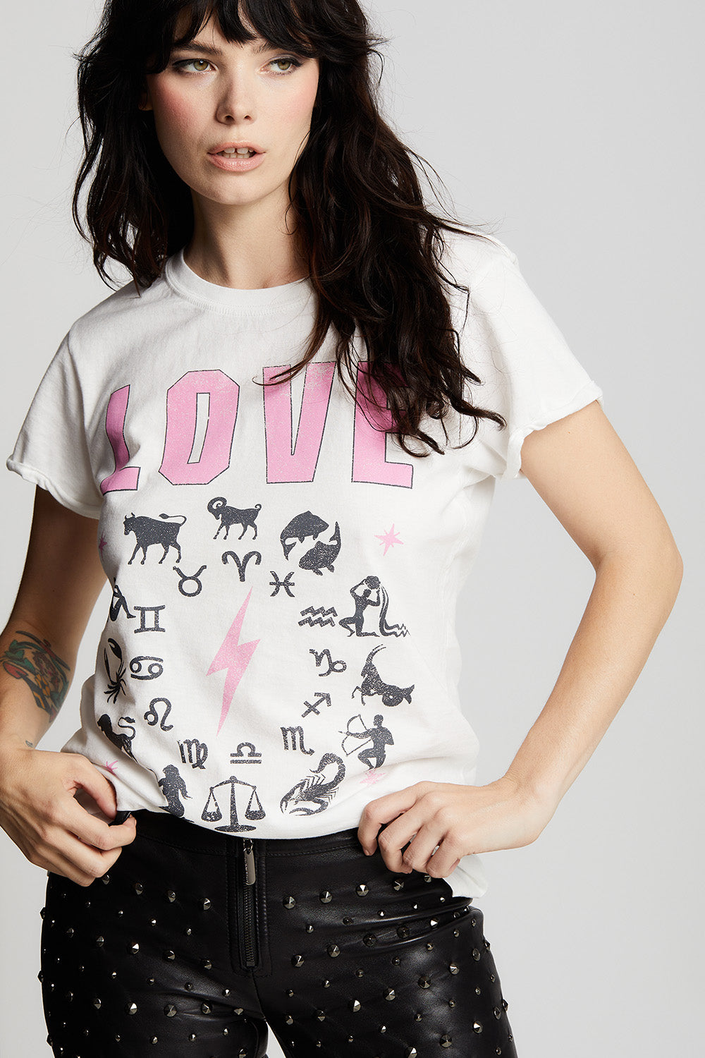 Women's All You Need Is Love T-shirt in White with zodiac signs and text